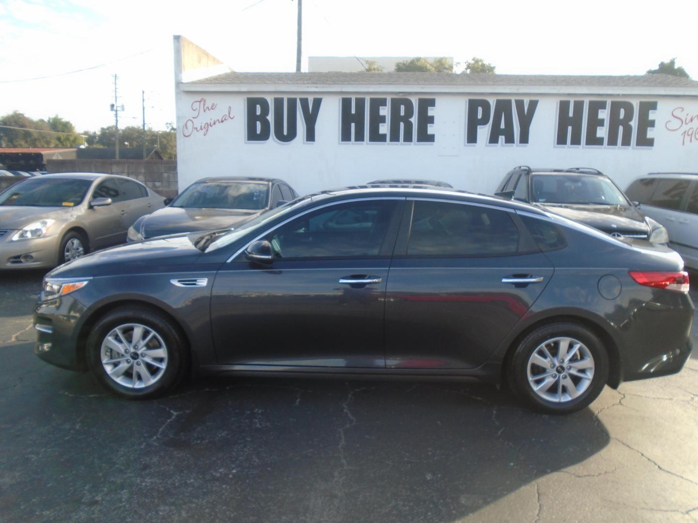 2018 Kia Optima (KNAGT4L31J5) with an 2.4L L4 DOHC 16V engine, 6-Speed Automatic transmission, located at 6112 N Florida Avenue, Tampa, FL, 33604, (888) 521-5131, 27.954929, -82.459534 - Photo#0